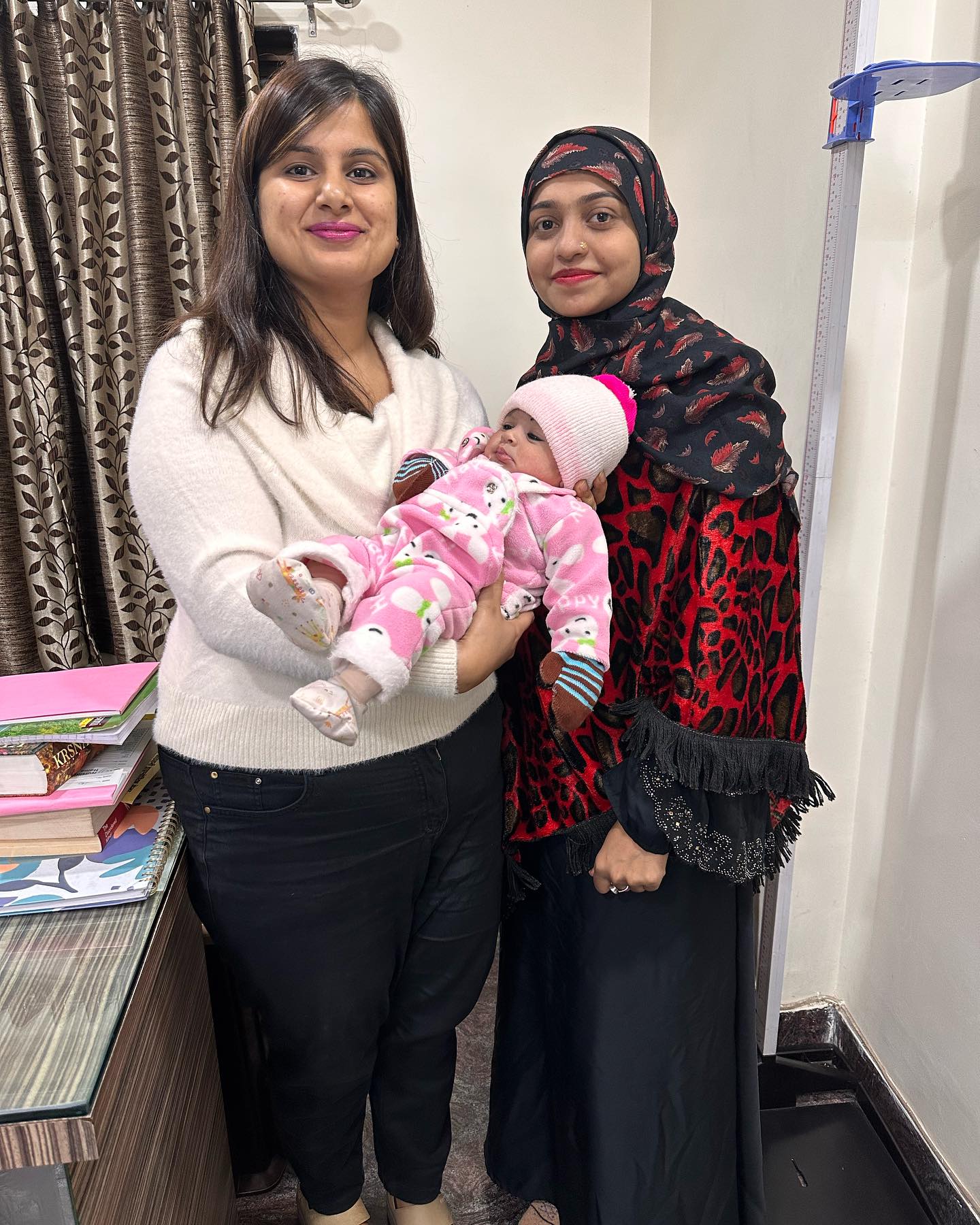 Dr. Nikita Kalda with mother and newborn baby after successful delivery at Kalda Nursing Home
